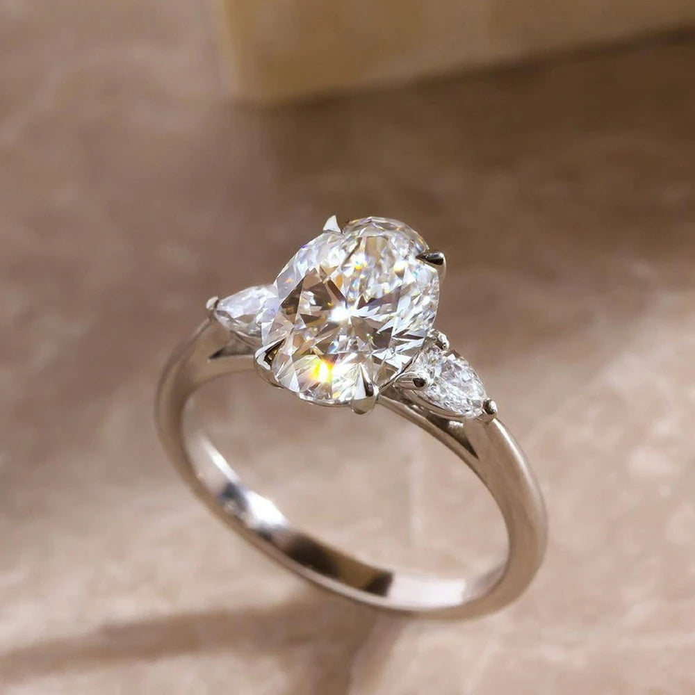 Oval Cut Moissanite 3-Stone Ring | Pear Side Stones | 3CT / 8CT Total | 925 Sterling Silver