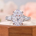 Oval Cut Moissanite 3-Stone Ring | Tapered Side Stones | 3CT / 4.5CT / 8CT | Certified | 925 Silver Platinum Plated