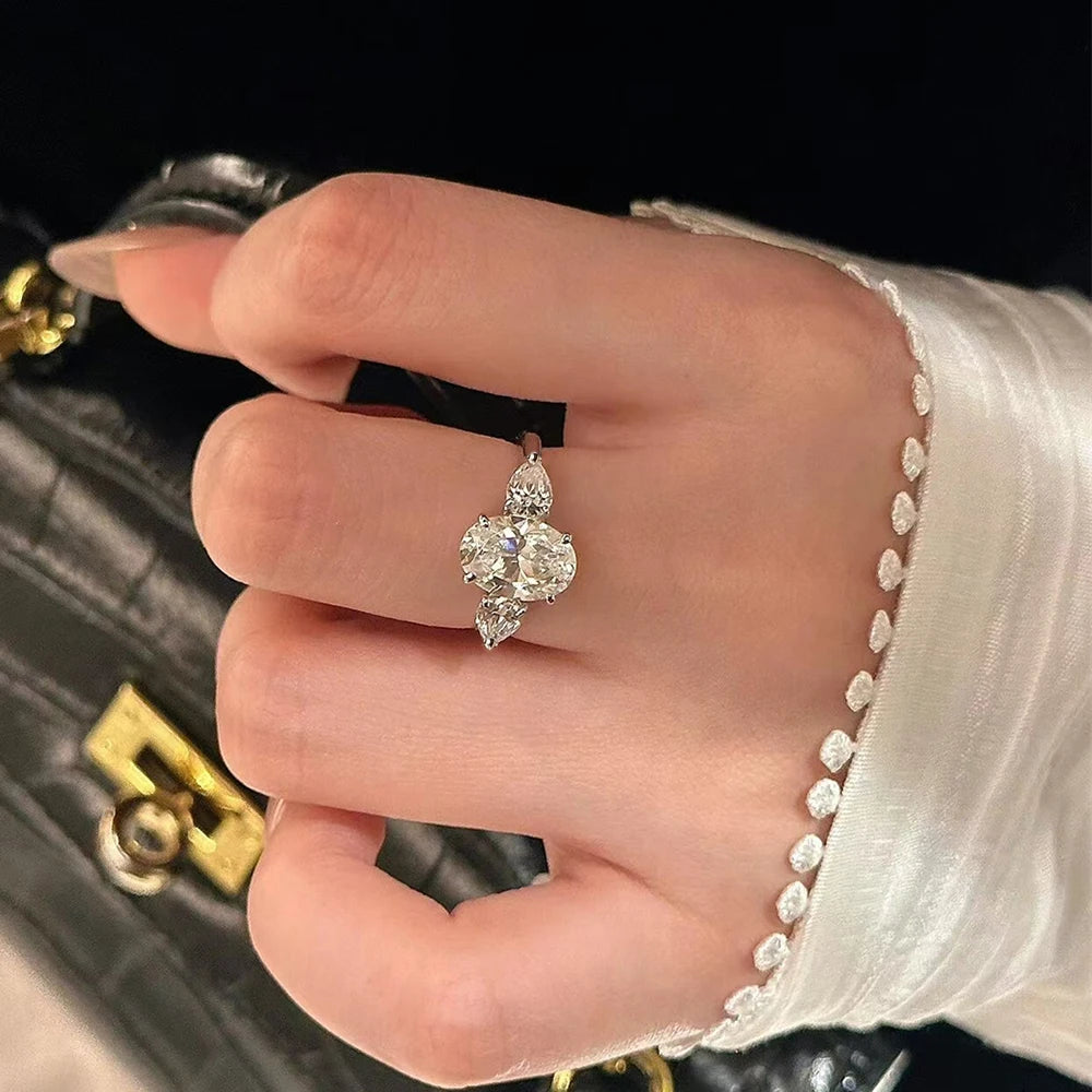 Oval Cut Moissanite 3-Stone Ring | Pear Side Stones | 3CT / 8CT Total | 925 Sterling Silver